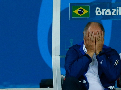 Brazil’s coach Luiz Felipe Scolari reacts during his team’s 2014 World Cup semi-finals against German 